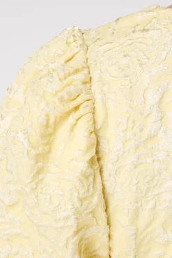 Blouse jacquard à manches bouffantes