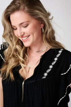 Blouse à manches courtes à volants